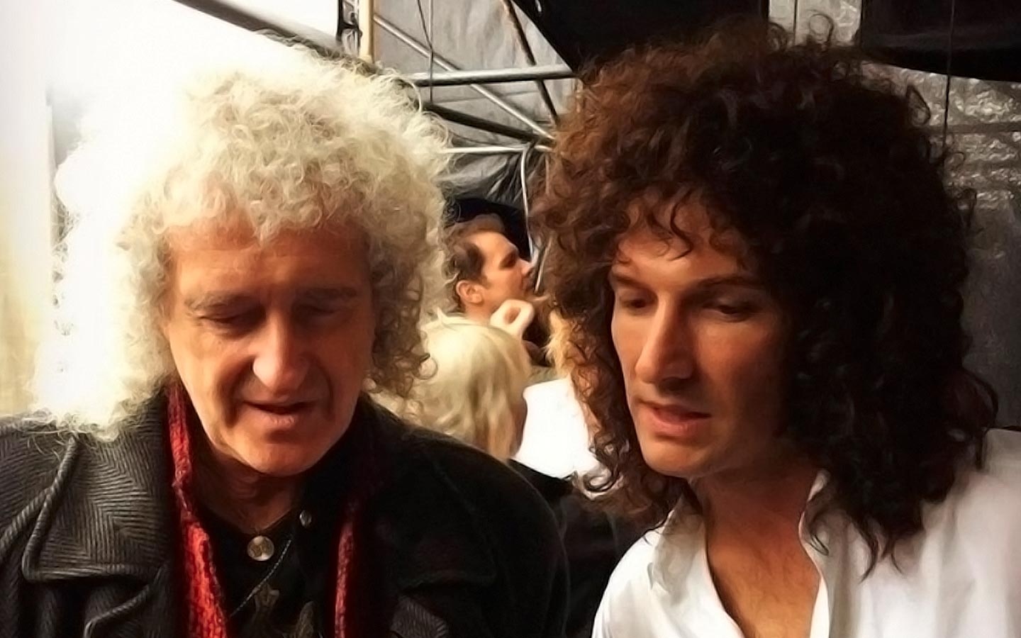 Brian May hace un dúo con su yo más joven en el video «Back to the Light»